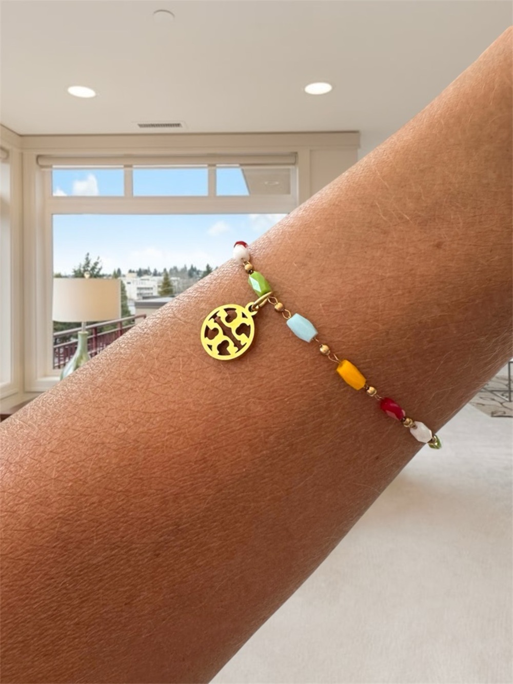 TORY BURCH DAINTY RAINBOW 18K GOLD SIGNATURE LOGO BRACELET